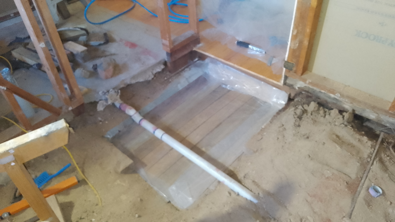Brilliant! After I arduously removed the floor tiles, the plumber got into action. First he changed the concrete floor into a Swiss cheese and then he knocked it out altogether...<br>