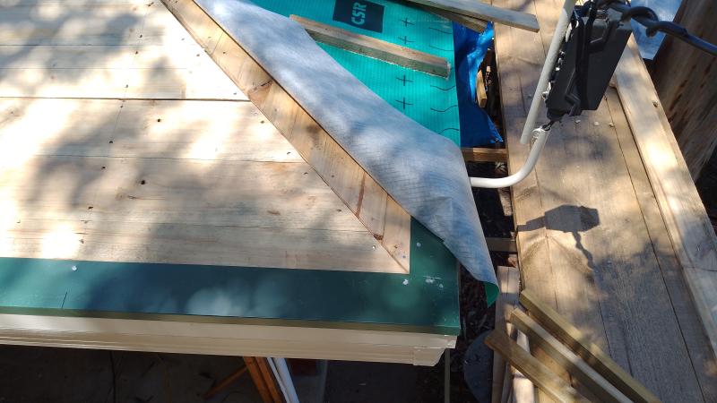 The diffusion-open membrane sits on top of the boards, fixed with air-battens