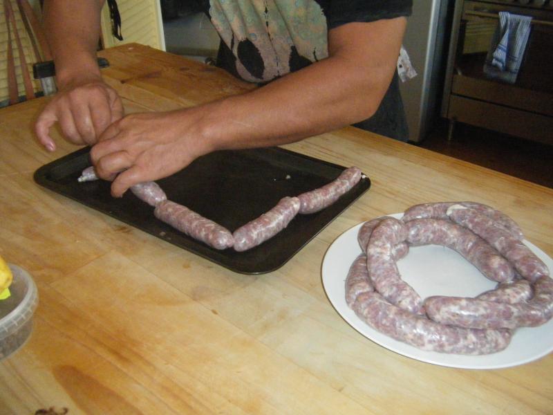 Trimming the sausages to equal length