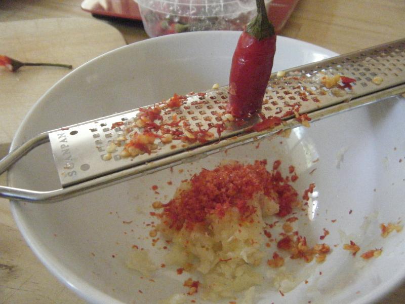 Using frozen chillies makes it easy to rasp them